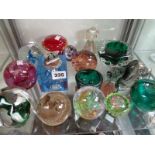 Collection of assorted Selkirk and other glass paperweights