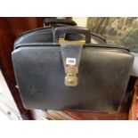 2 Black Leather vintage executive cases with brass fittings