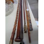 Vintage Yard stick, Bamboo walking cane, 2 Gun cleaning rods and assorted sticks