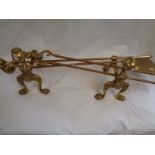 Pr. Of early 20thC Brass Ball and claw design fire dogs and a matching 3 piece companion set