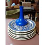 6 Iznic style decorated chargers and a Blue waisted vase