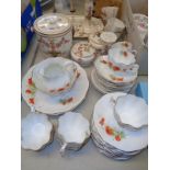 Devon ware Etna transfer printed biscuit barrel, Floral decorated dressing table set and a Poppy