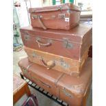 4 Harlequin graduated suitcases