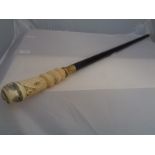 Reproduction Faux Ivory topped walking cane of Marine decoration with interior drinks flask