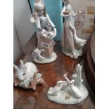 Lladro figure of a woman with chicken and basket, Lladro figure of girl with Cat and 3 kittens,