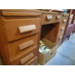 Oak Art Deco Desk of 8 Drawers with Cup handles possibly from Heals