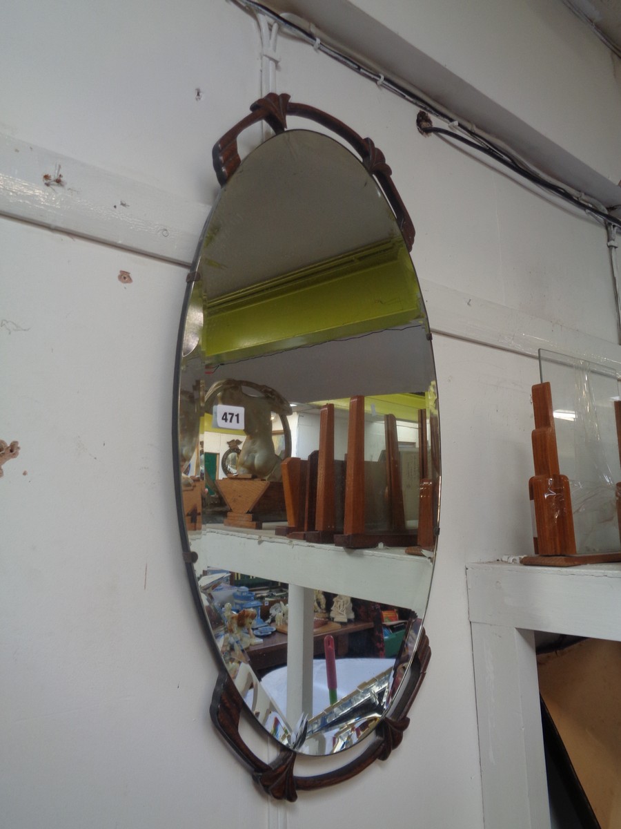 Cut glass oval mirror with Oak foliate decoration