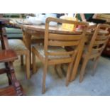 Art Deco Walnut Extending dining table and a set of 6 upholstered Walnut dining chairs