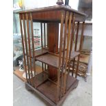 Good quality 20thC Revolving bookcase of walnut veneer with satinwood inlay