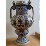 German Salt glaze two handled vase with applied Lion roundel decoration