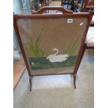 Good quality Mahogany framed fire screen with Swan decoration