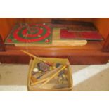 A miniature table croquet set, Bagatelle, hoopla, cribbage board, chess pieces et cetera