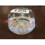 A fine Millifiori and latticino glass paperweight with S cane and date cane '71