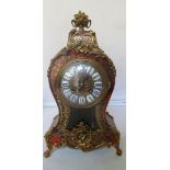 A Boulle mantel clock.