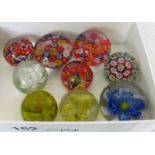 Nine small paperweights