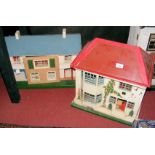 An old metal and wood TRI-ANG dolls house with fitted vintage furniture within - 46cm wide x 30cm