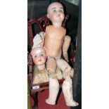An old large German bisque head doll with composite body - marked 305 - 64cm long - together with