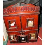An old wooden four room dolls house with fitted vintage furniture - 58cm wide x 40cm high