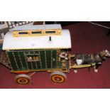 An unusually large old model child’s Gypsy caravan with wooden horse, having fully fitted interior -