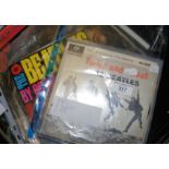 Collection of original issue Beatles LP’s, EP’s and 45 rpm singles, books and magazines