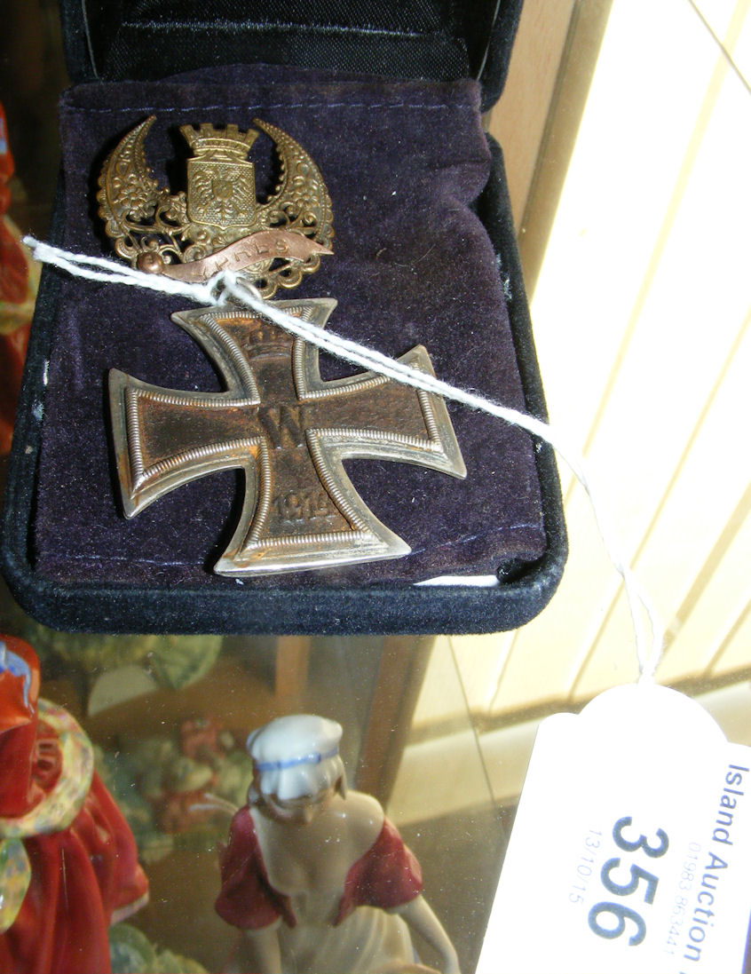 First World War German Iron Cross Medal, together with a commemorative brooch