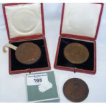 Two commemorative medallions, including 1902 Coronation Medal and one other