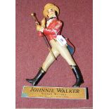An original Johnnie Walker Scotch Whisky advertising figure