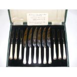 A good quality set of six knives & forks with ivory handles & stainless steel blades in their