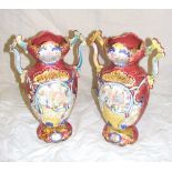 A pair of 20th century Italian hand painted pottery vases in red, with number to their bases "