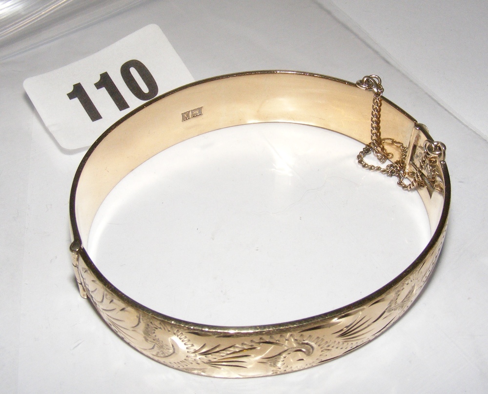 A gold on silver bangle.