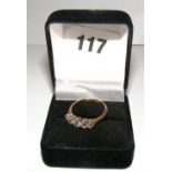 An 18ct gold & platinum ring set with fi