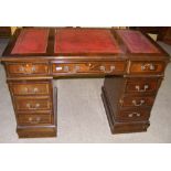 A Victorian style inlaid writing desk wi