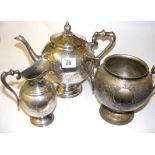 An electroplated three piece tea service. CONDITION REPORT: No structural damage, would benefit from