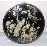 A large Oriental lacquer plaque set with