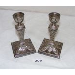 A pair of Victorian silver plated candle