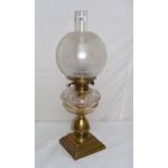 A brass oil lamp, chimney & shade.