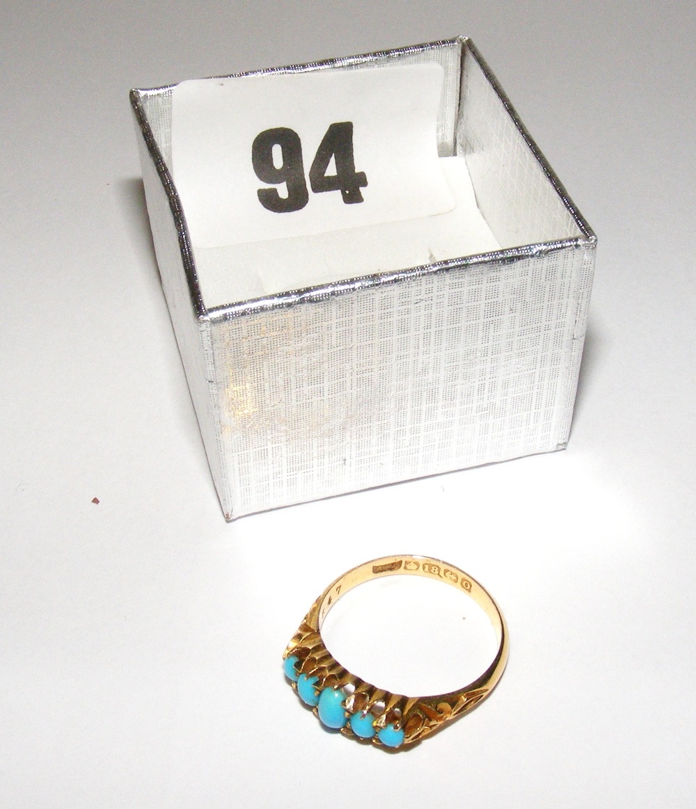 An antique 18ct gold ring set with five