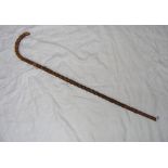 A Victorian wooden walking cane with 9ct