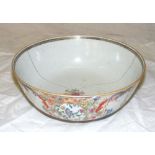 A Chinese famille rose bowl painted with figures. CONDITION REPORT: This bowl has been cracked &