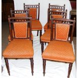 Six Edwardian dining chairs upholstered