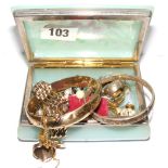 A box containing a 9ct gold bangle weigh