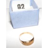 An 18ct gold ring weighing 1.1 grams, ri