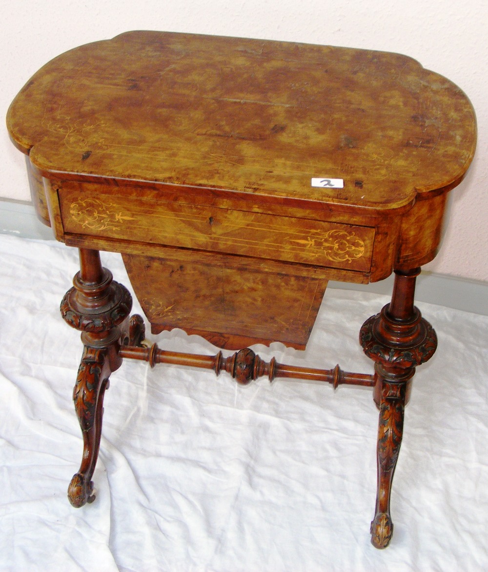 A Victorian burr walnut veneer sewing box table. CONDITION REPORT: Good condition