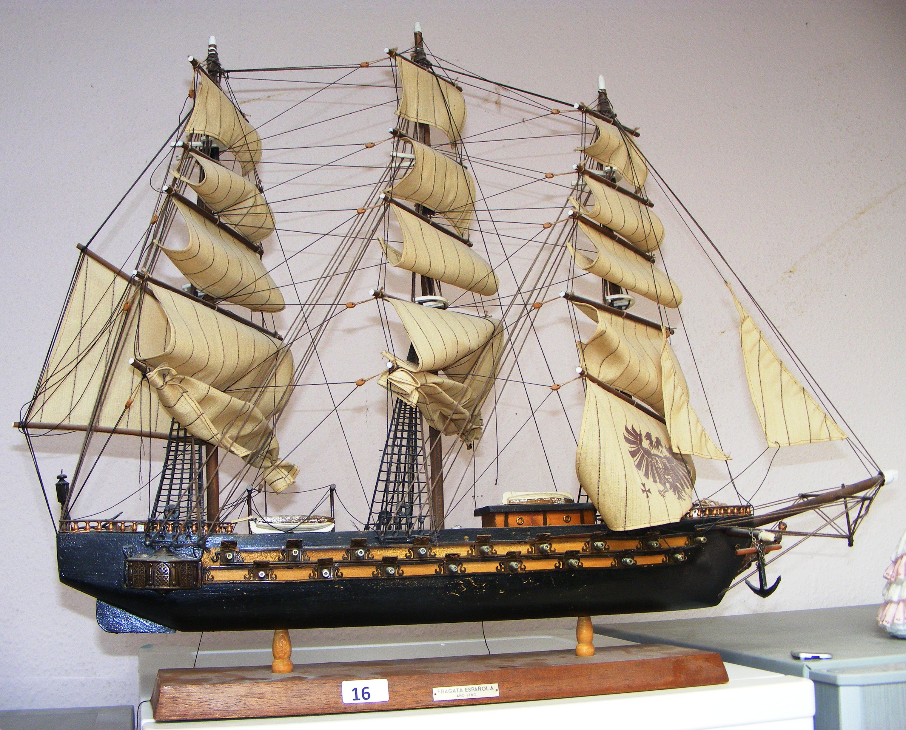 A model frigate, with plaque titled "Frigate Espanola 1780". 80cm wide. CONDITION REPORT: In good