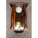 A wooden wall clock.