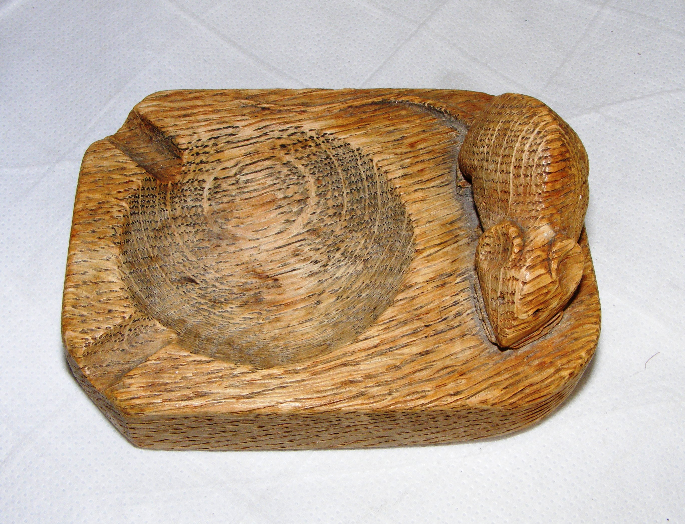 A Robert Mouseman Thompson style wooden ashtray. CONDITION REPORT: Note: we do not offer an in house