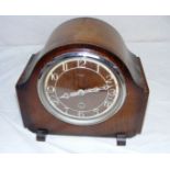 A vintage mantle clock. CONDITION REPORT: Note: we do not offer an in house postage service, we