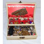 A box containing assorted costume jewellery. CONDITION REPORT: Note: we do not offer an in house