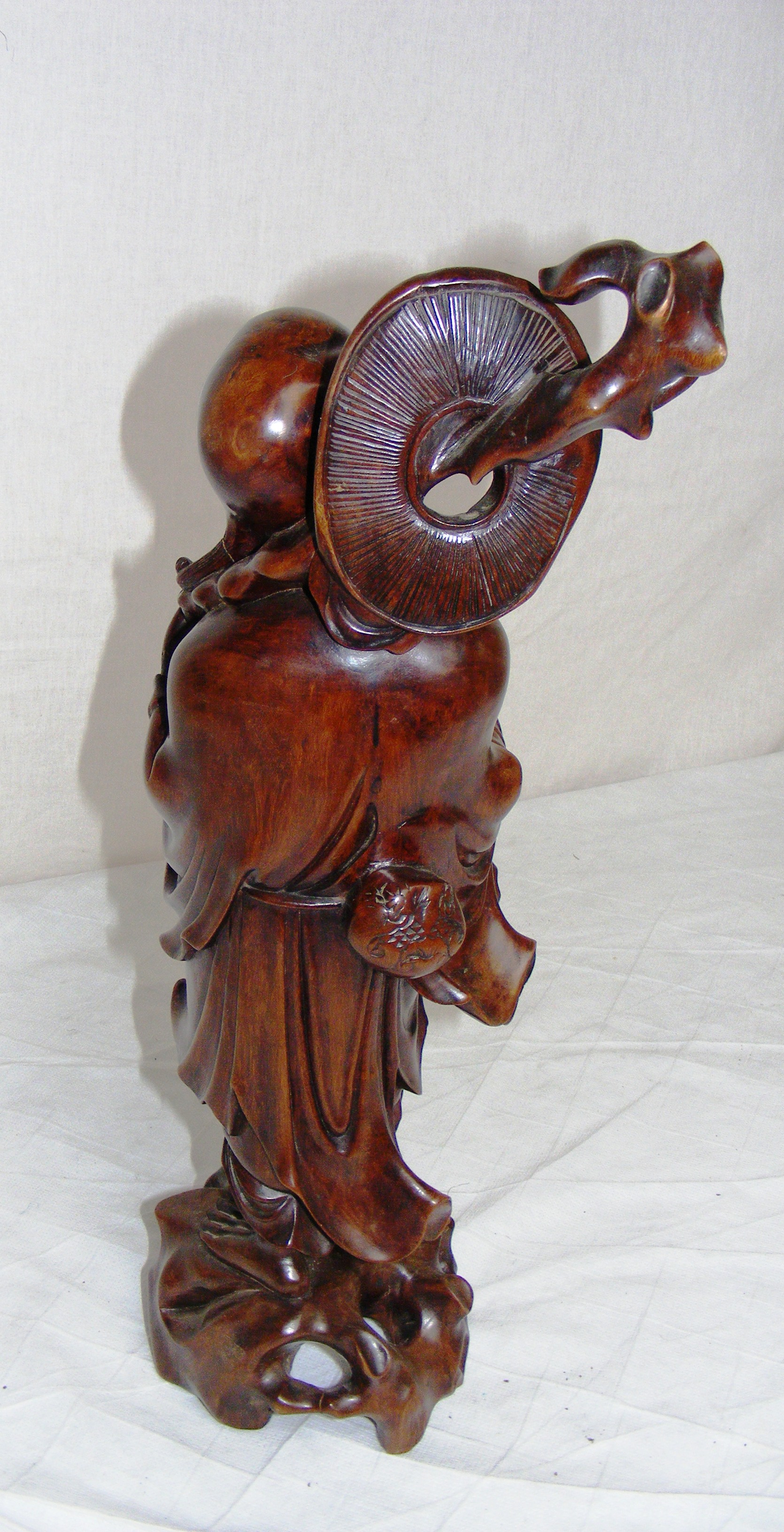 A Chinese hardwood figurine. - Image 4 of 6