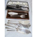 A cased carving set, fish servers & other sets.